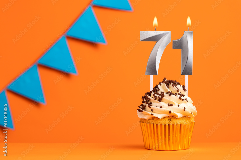 Birthday cake with candle number 71 - Orange background