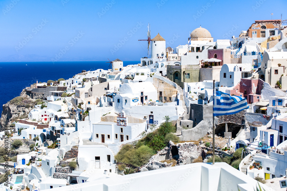 full panoramic view full of houses and hotels  oia village from the highest spot of the area santorini aegean sea greece