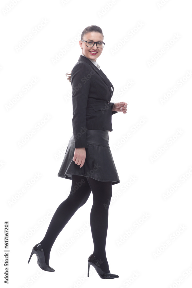 in full growth. smiling businesswoman confidently striding forward in full growth. smiling businesswoman confidently striding forward