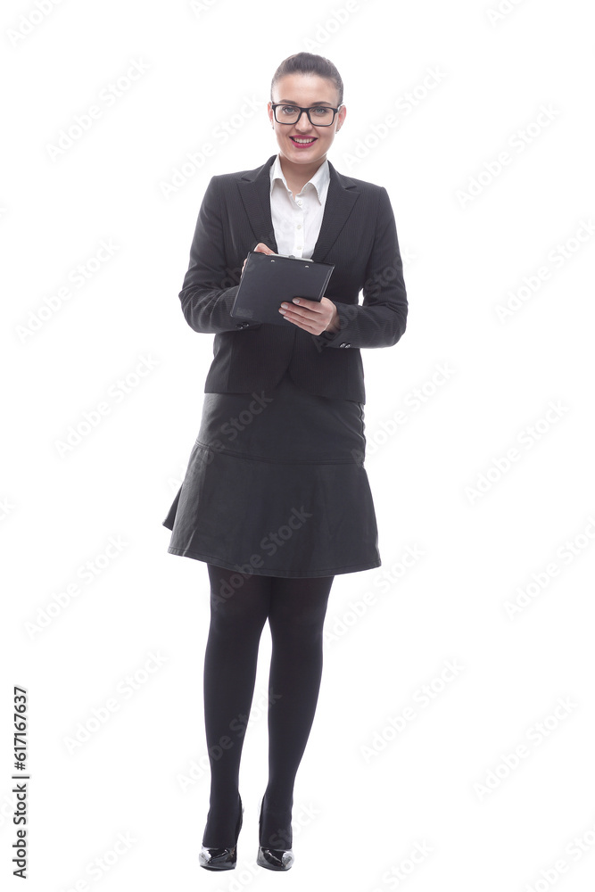 in full growth. smiling businesswoman taking notes in the clipboard in full growth. smiling businesswoman taking notes in the clipboard