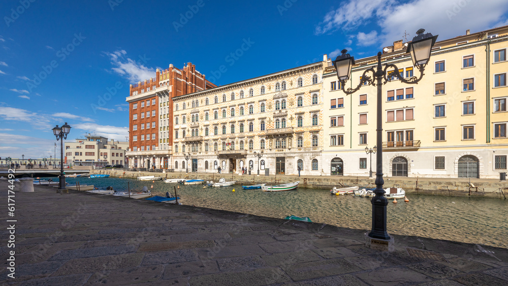 The Canal grande with the Gopcevich palace, a navigable canal in center of Trieste, Italy, Europe.