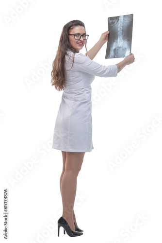 in full growth. a female doctor with an x-ray of a patient