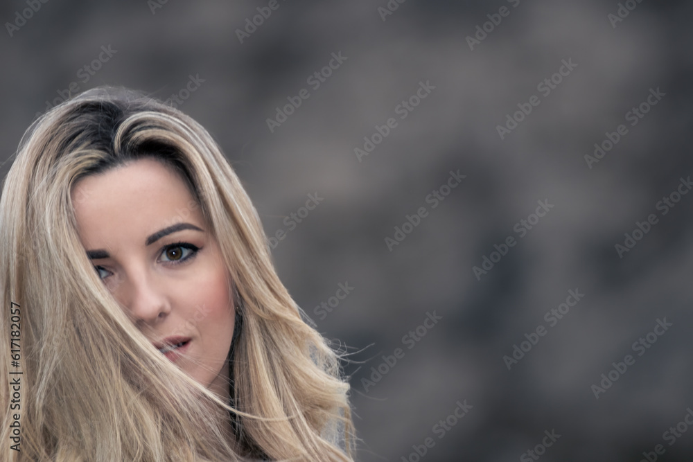 Mountain Radiance: A Captivating Portrait of a Blonde Woman Engaging the Camera in Nature's Embrace Mountain Radiance: A Captivating Portrait of a Blonde Woman Engaging the Camera in Nature's Embrace