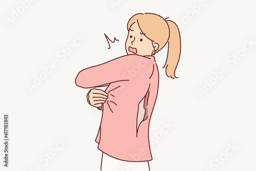 Woman with clothes torn at back is nervous and needs help of tailor because of poor quality textiles