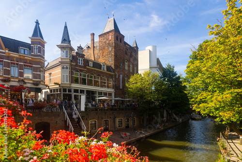 Scenic view of ancient buildings along canals in Dutch city of Utrecht at summer