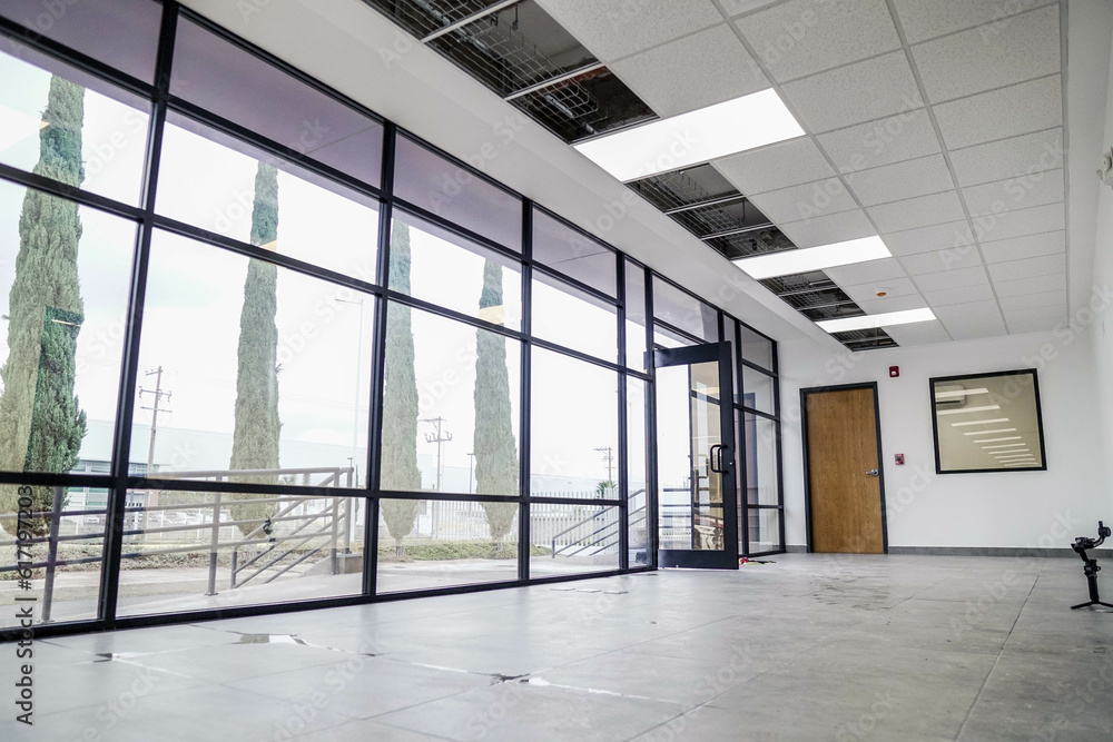 Fototapeta premium White open space office interior, mock up wall, office building interior.