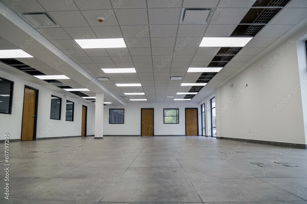 White open space office interior, mock up wall, office building interior. White open space office interior, mock up wall, office building interior.