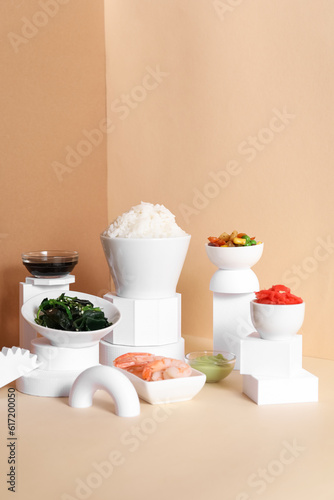 Composition with tasty Chinese food and plaster decor on color background