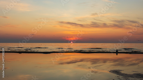 Sunset over Baltic sea  golden hour  Summer Solstice over Baltic sea  Ligo  Beach