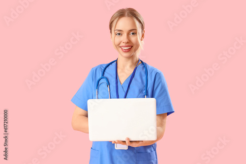 Female medical intern using...