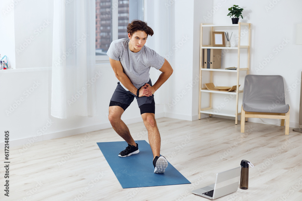dumbbells man training lifestyle laptop activity gray home health sport indoor