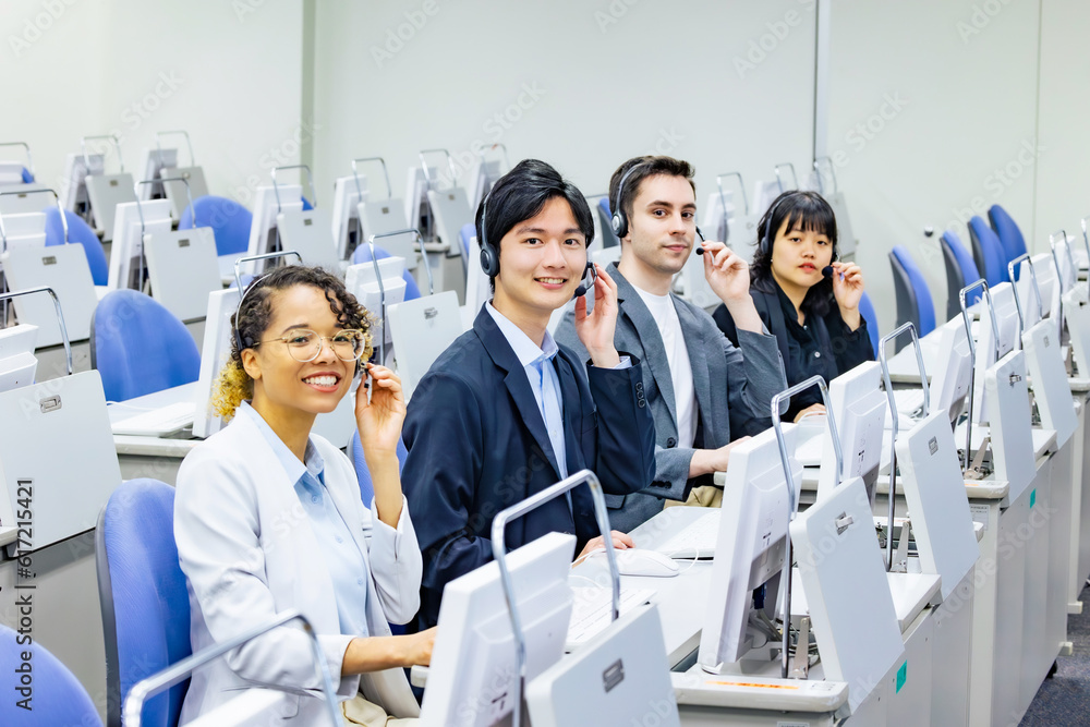 Multinational operator group working in the office. Call center. Customer support staff. Multinational operator group working in the office. Call center. Customer support staff.