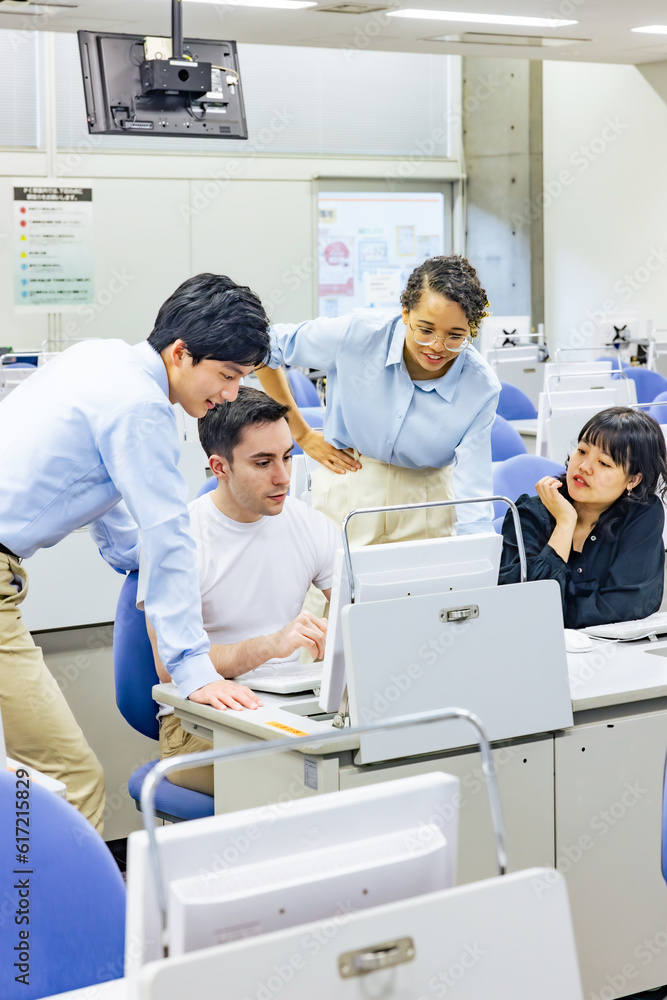 Fototapeta premium Multinational group having a conversation in the office. International school. Global business.