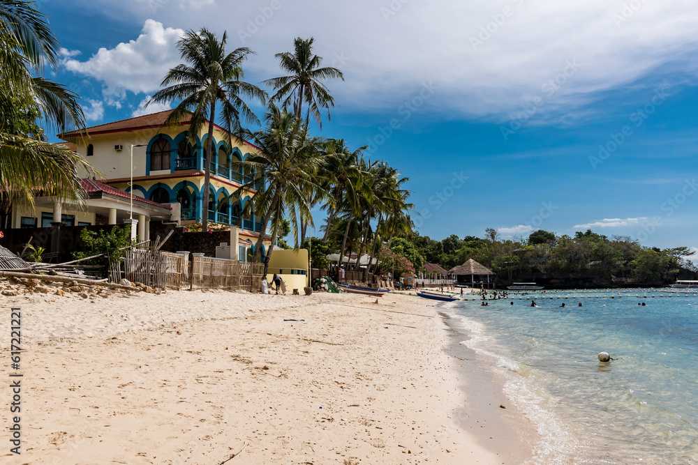Nueva Valencia, Guimaras, Philippines - April 22, 2023: Resorts line Alubihod Beach, a popular beach retreat.