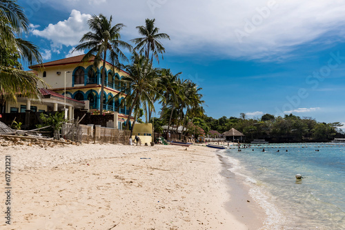 Nueva Valencia, Guimaras, Philippines - April 22, 2023: Resorts line Alubihod Beach, a popular beach retreat. photo