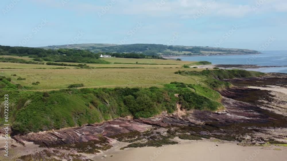 Traeth Lligwy Anglesey island eroded coastal shoreline aerial view scenic green Moelfre weathered coastline Traeth Lligwy Anglesey island eroded coastal shoreline aerial view scenic green Moelfre weathered coastline