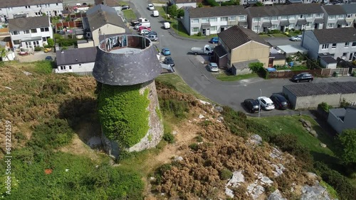 Melin Wynt Y Craig hilltop Llangefni windmill ivy covered landmark aerial view circling above old mill photo