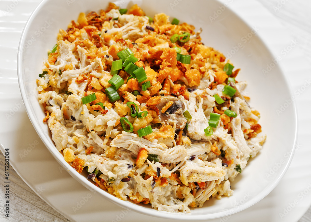 Chicken Rice Casserole in white bowl, top view Chicken Rice Casserole in white bowl, top view