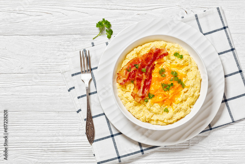 Cheddar Cheese Grits Casserole with bacon slices