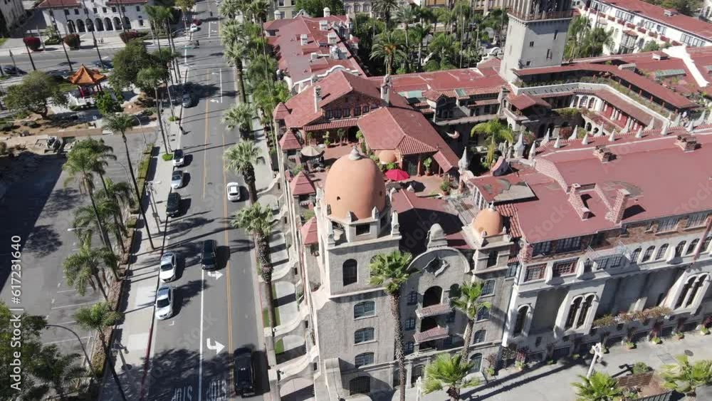 A sweeping drone shot orbits the historic Mission Inn Hotel and Spa in ...