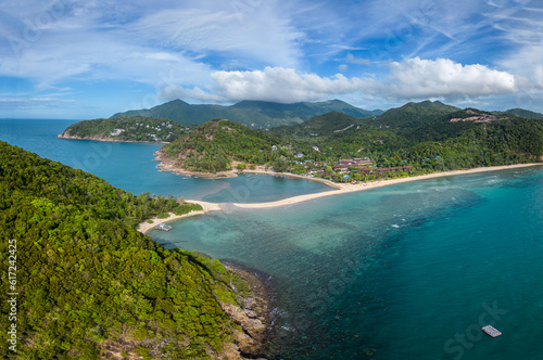 Koh Phangan, Thailand: Dramatic aerial panorama of the Mae Haad beach in the Ko Pha Ngan island in the gulf of Thailand in Southeast Asia.