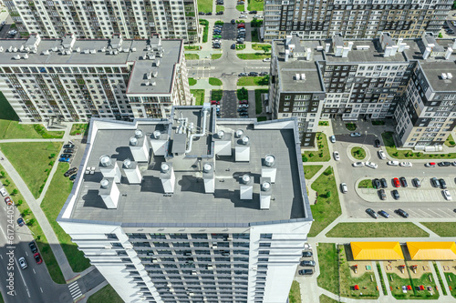 rooftop of high-rise apartment house with ventilation system. detailed aerial view.