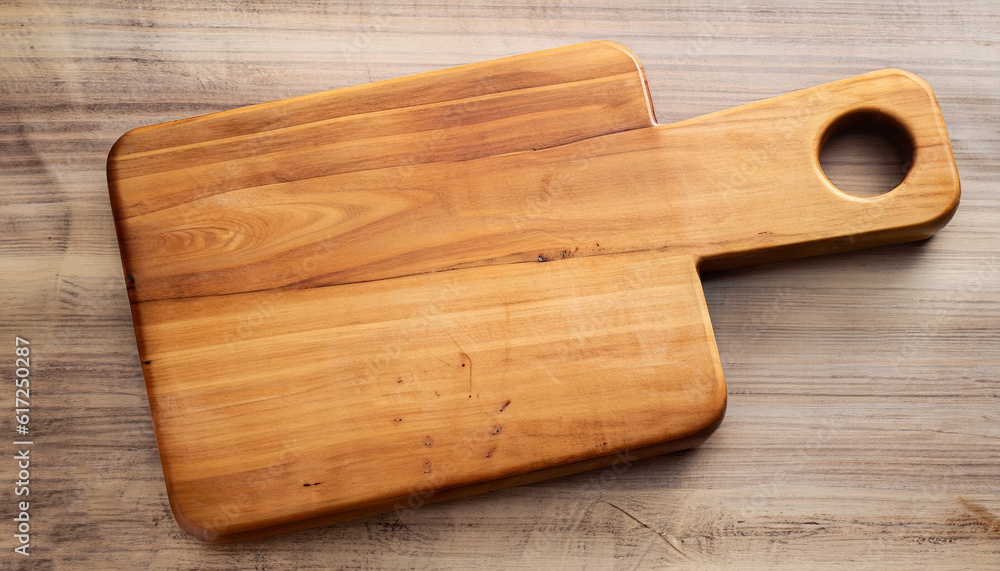 Top view of wooden tray on wooden table background. Top view of wooden tray on wooden table background.