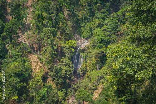 Giant waterfall amoung the forest from top view (Rinjani, Lombok, Indonesia)