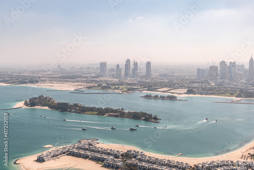 View from observation deck of the Nakheel Mall building to the Palm Jumeirah island and Dubai City in Dubai city, United Arab Emirates photo