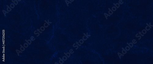 Natural blue slate stone background pattern with high resolution. Top view, copy space, dark blue rough grainy stone or concrete wall texture background.