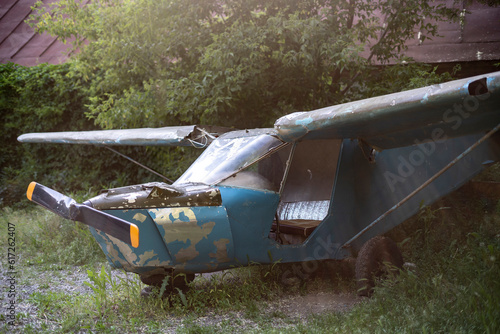 old abandoned small plane left in the forest