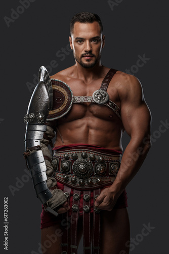 Gladiator is captured in lightweight, yet regal, historical armor against a neutral background.