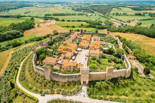 Beautiul aerial view of Monteriggioni, Tuscany medieval town on the hill. Tuscan scenic landscape  with ancient walled city Monteriggioni, Italy. photo