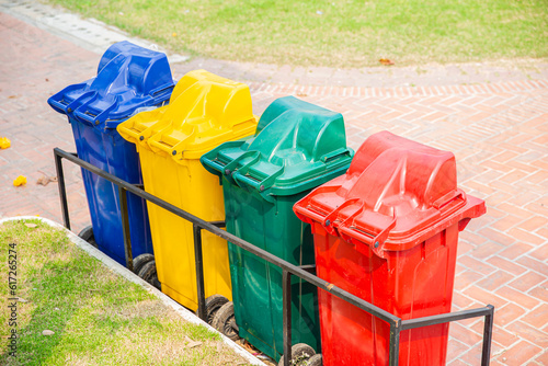 Multi colors seperate gabage type trash bin waste management for recycle in public area photo