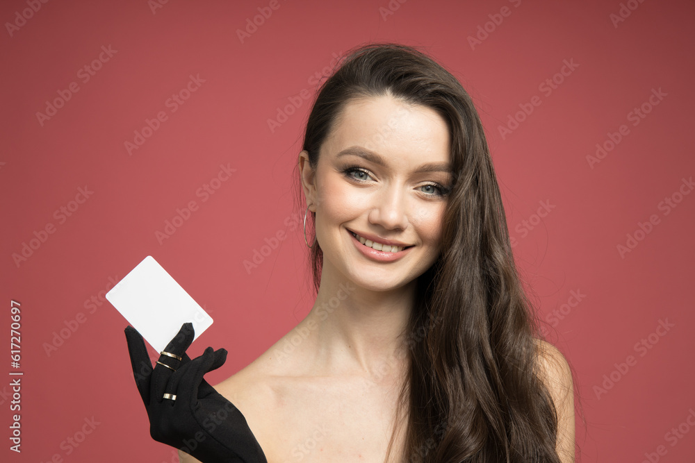 Pretty girl with a discount card in her hand Pretty girl with a discount card in her hand