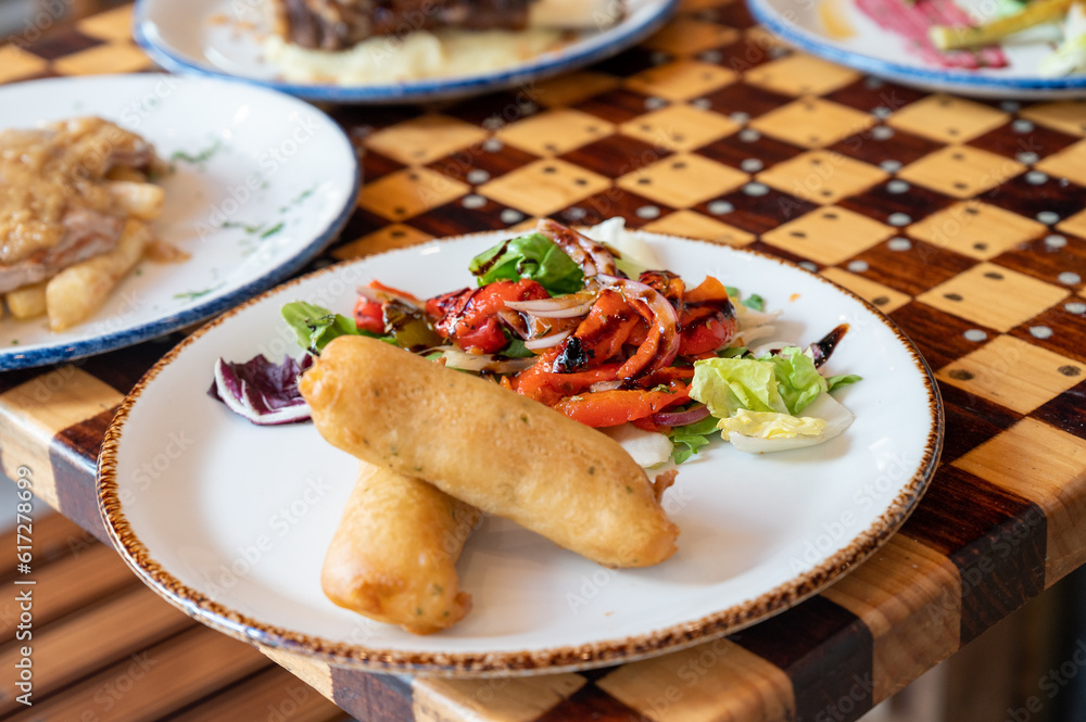 Wholesome, colorful plate of fresh fruits and vegetables - a scrumptious healthy meal. Wholesome, colorful plate of fresh fruits and vegetables - a scrumptious healthy meal.