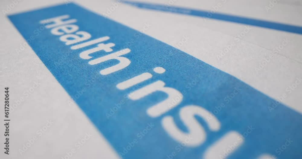 Blue medical health insurance form on paper closeup 4k movie. Affordable health insurance concept Blue medical health insurance form on paper closeup 4k movie. Affordable health insurance concept