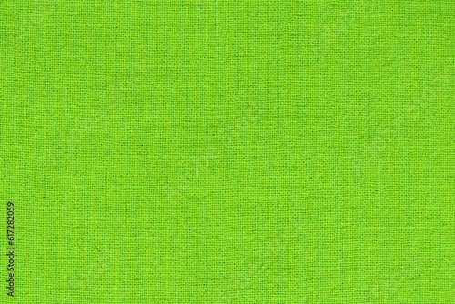 Light green cotton fabric cloth texture for background, natural textile pattern.