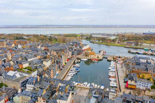 City Skyline Overlooking River in Urban Landscape Captivating aerial view of a vibrant metropolis with stunning skyline and river. drone honfleur france