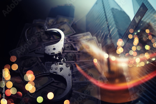  Double exposure city and hands of a man with handcuffs on a background of us dollars. Fraud  cyber crime concept. Arrest of an entrepreneur in the workplace.