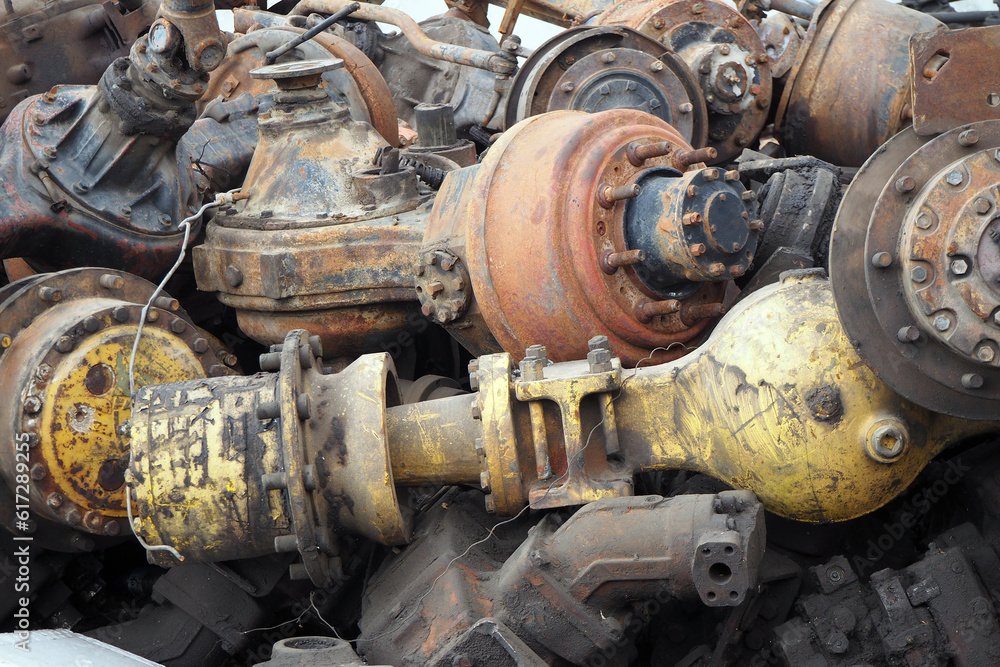 Parts of old engines. Heavy industry machinery waste. 