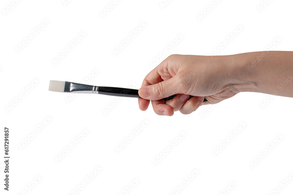 Hand using a little paintbrush isolated on a transparent background Hand using a little paintbrush isolated on a transparent background