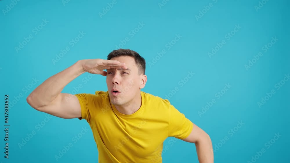 Man with the hand on the foreground looking away Man with the hand on the foreground looking away
