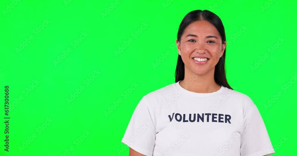 Volunteer, green screen and a woman pointing at space for advertising, charity or information. Face of happy asian person with a hand and tshirt for nonprofit project, NGO help or donation in studio Volunteer, green screen and a woman pointing at space for advertising, charity or information. Face of happy asian person with a hand and tshirt for nonprofit project, NGO help or donation in studio