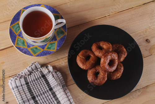 Ali agrem cake is a traditional Sundanese food originating from Karawang, which at first glance looks similar to a donut because it is round and has a hole in the middle. 
 photo