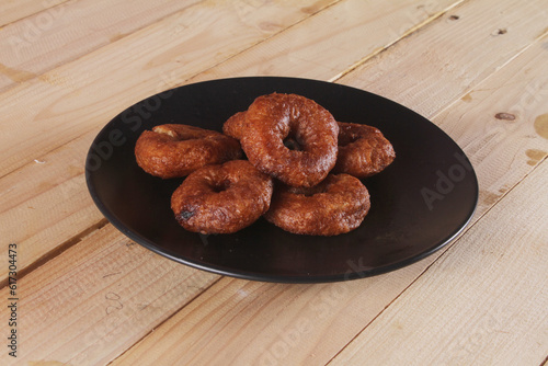 Ali agrem cake is a traditional Sundanese food originating from Karawang, which at first glance looks similar to a donut because it is round and has a hole in the middle. 
 photo