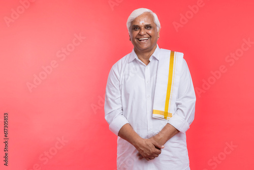 Photography Happy senior man in traditional south Indian clothing
