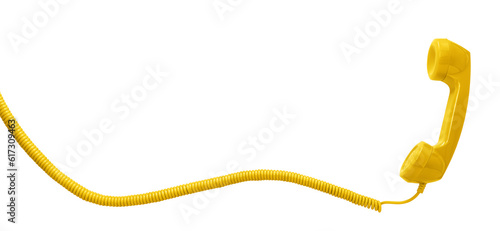 Yellow vintage telephone handset isolated on white background with copy space