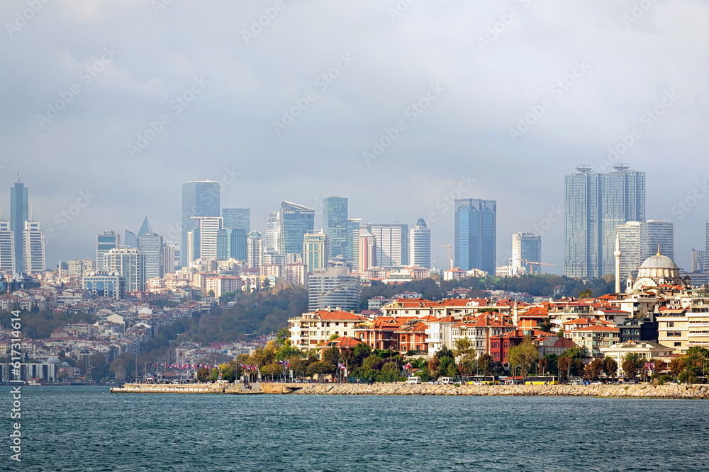 Istanbul panorama as seen from Bosphorus. Sunny october day, beautiful clouds, city towers at skyline. Istanbul, Turkey