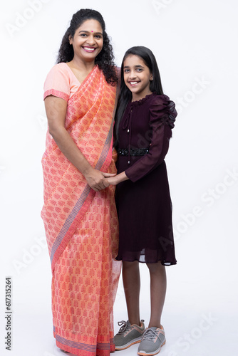 Photography Loving mother with daughter on white background,